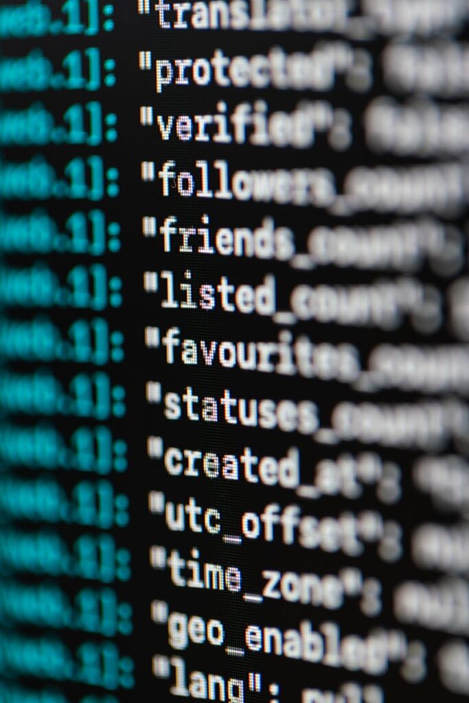 pexels-photo-3861976-3861976 Extreme close-up of computer code displaying various programming terms and elements.